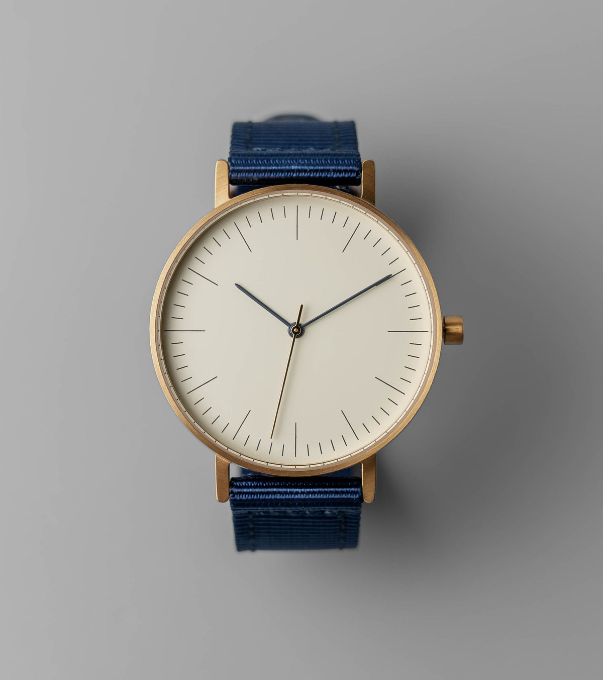 B001 gold case, off white dial